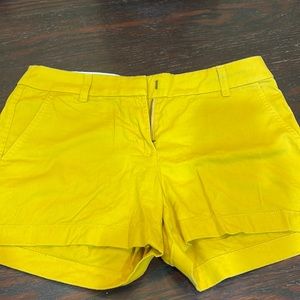 Size 4 J. Crew shorts. Excellent condition. Mustard yellow-